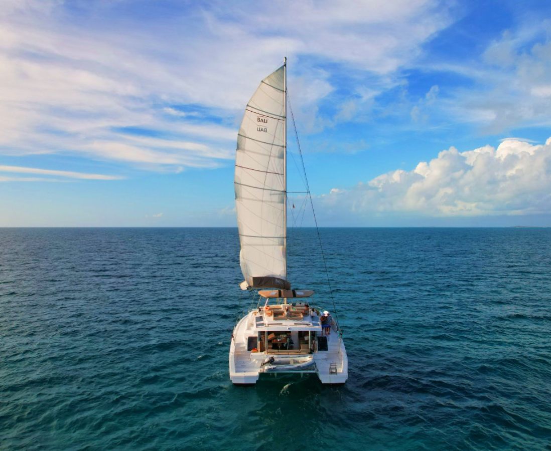 downwind sailing in the Exumas aboard a bareboat charter wtih an added skipper