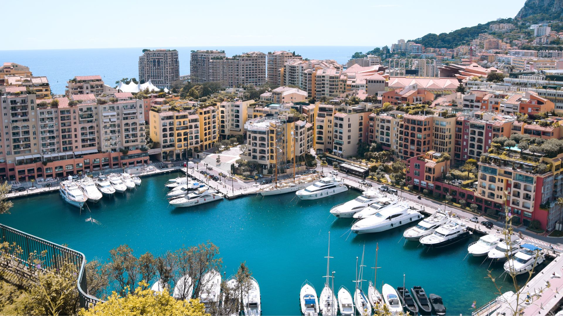 Monaco's Port Hercule from above with yachts in the harbor