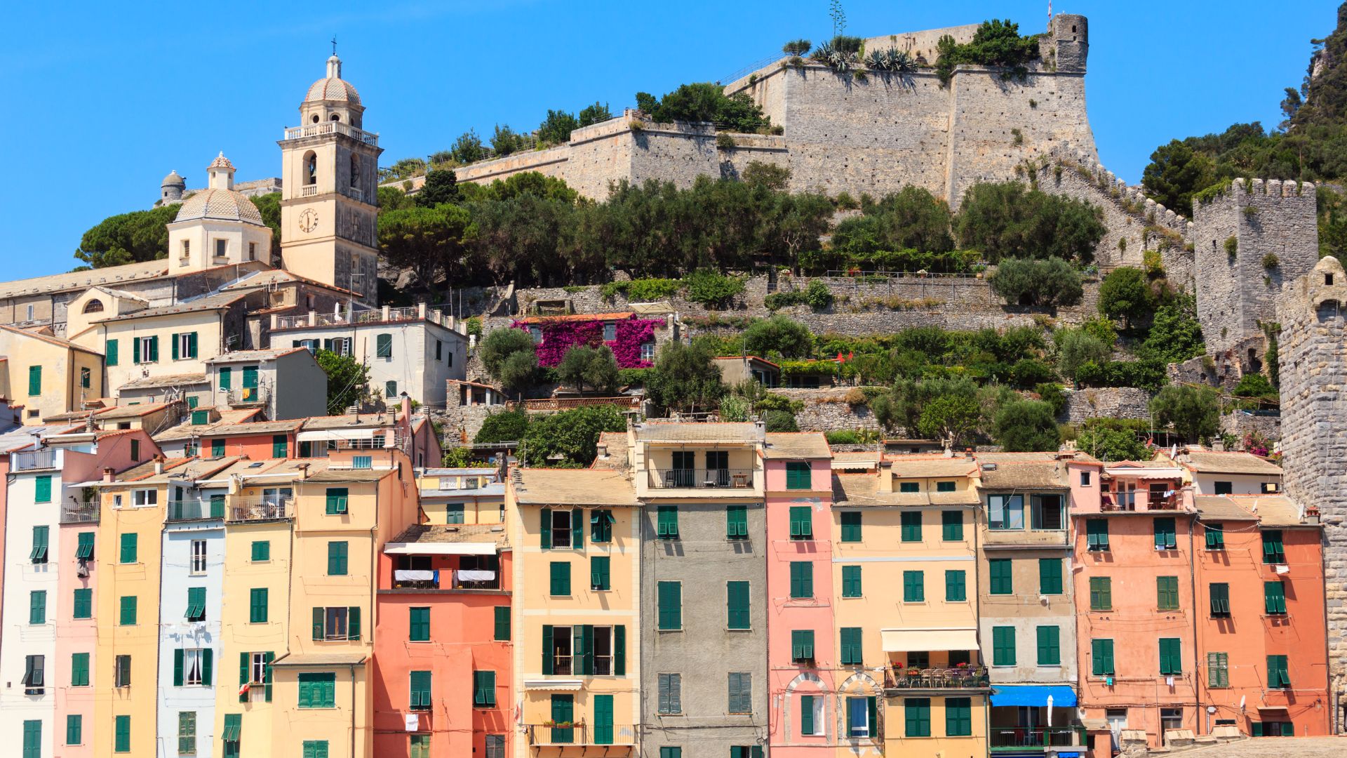 Portovenere's painted-house facade above the harbor on the Gulf of La Spezia