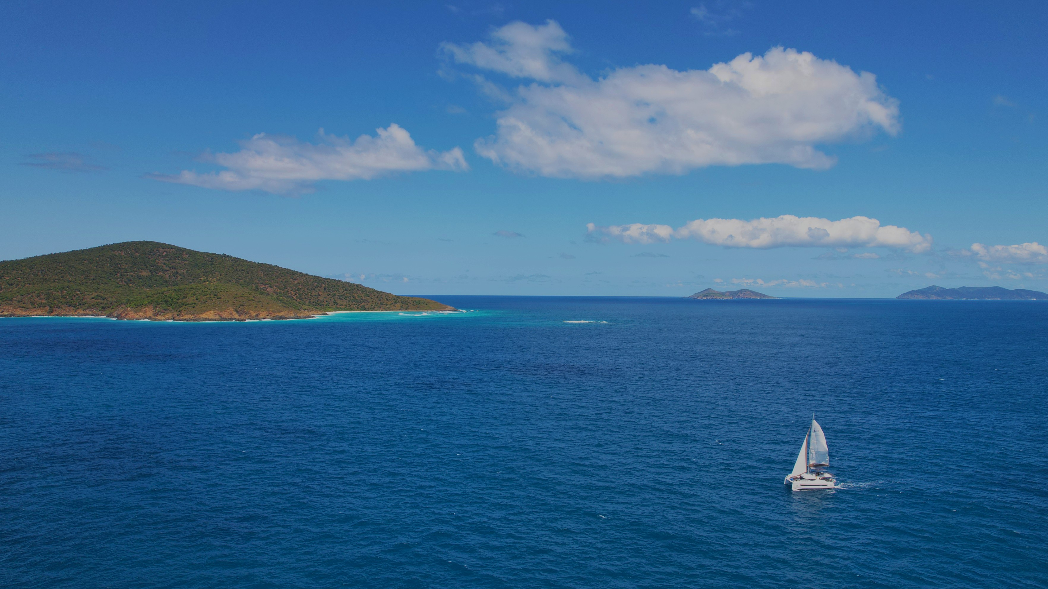 Explore Hans Lollik Island, USVI: A private paradise with stunning anchorages at Coconut Bay and between the Lolliks. Enjoy snorkeling and secluded beaches.