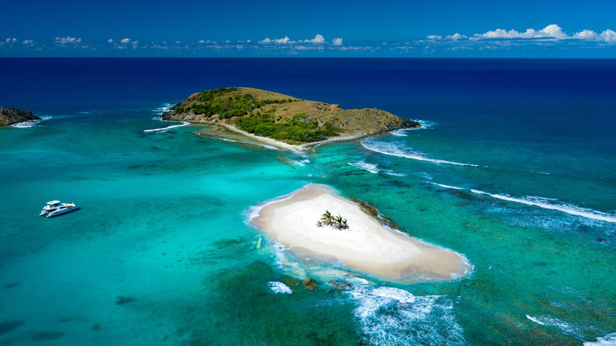 Sandy Spit in BVI, a tiny, iconic sand bar perfect for a quick escape and spectacular photo ops.