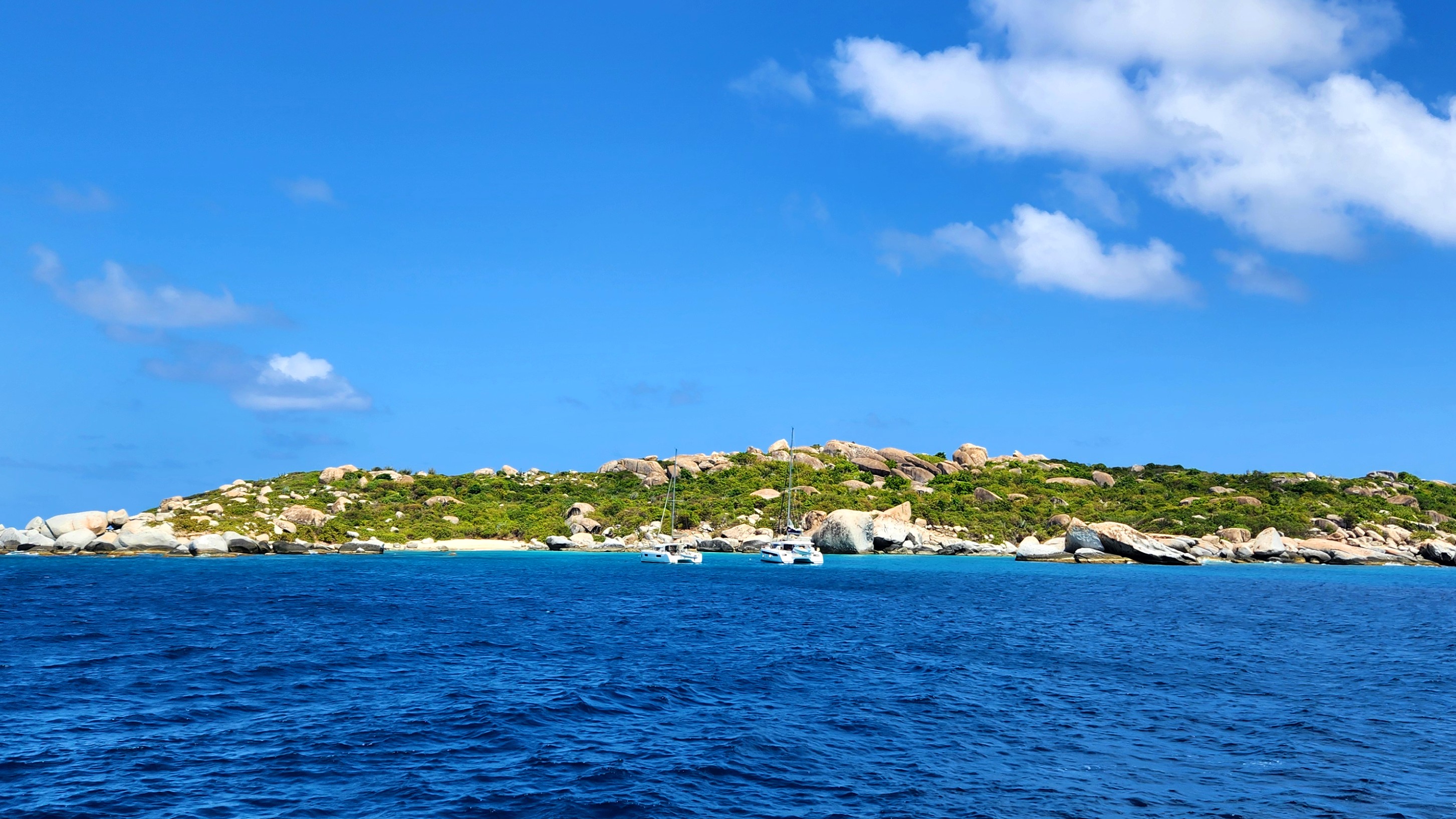 Explore Fallen Jerusalem, BVI: A secluded island with stunning rock formations, excellent snorkeling, bird-watching, and serene shores.