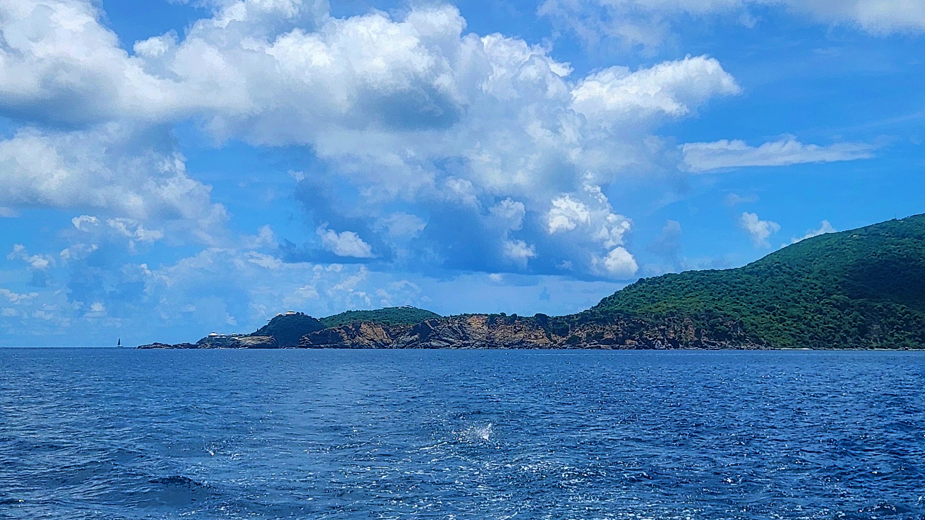 Discover Mountain Point, Virgin Gorda: A snorkeling paradise with an underwater arch, vibrant marine life, and a serene setting.