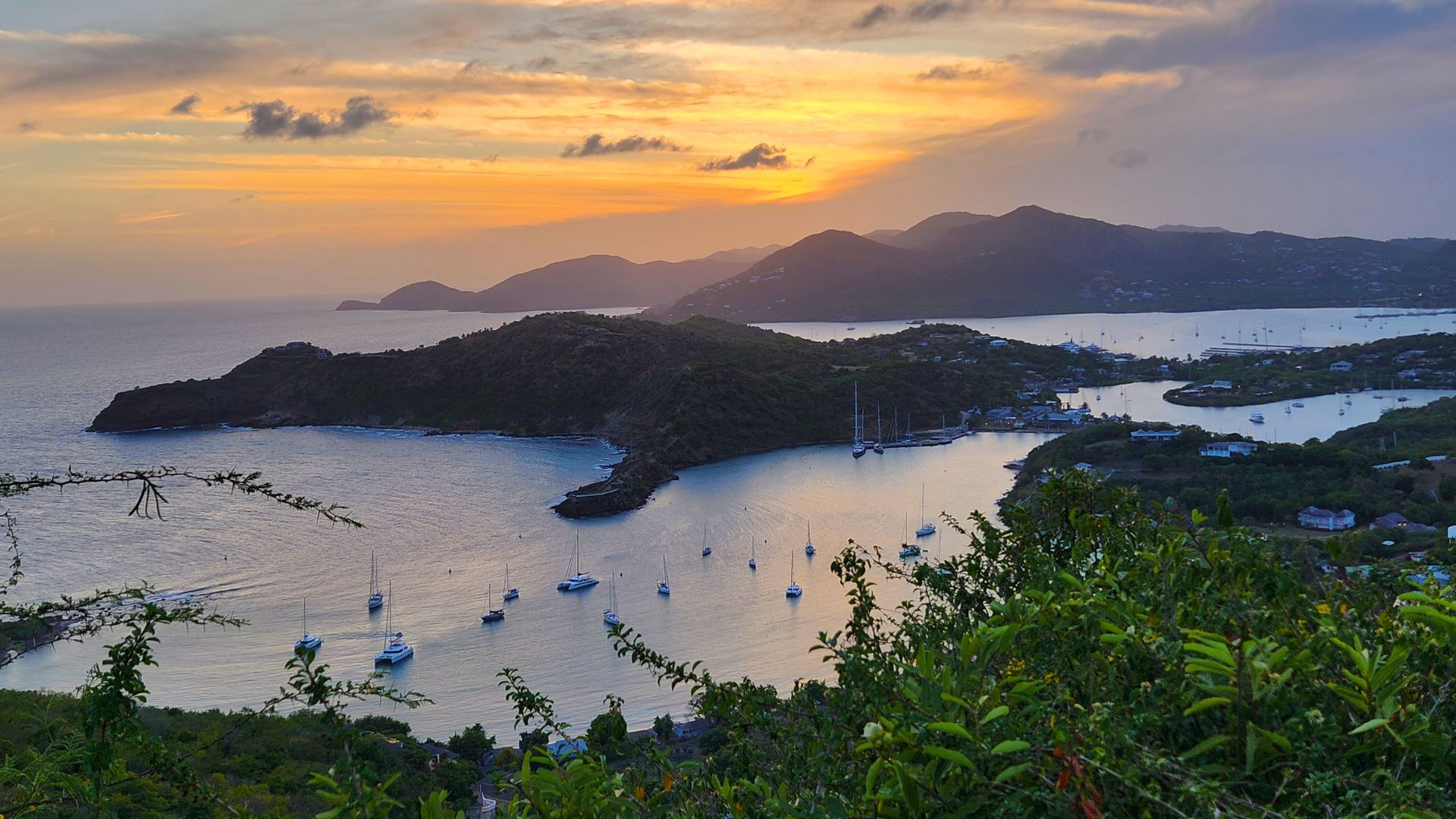 Visit Shirley Heights in Antigua for stunning views, BBQ parties, and vibrant atmosphere. Enjoy sunsets, live music, and affordable drinks in this iconic spot.