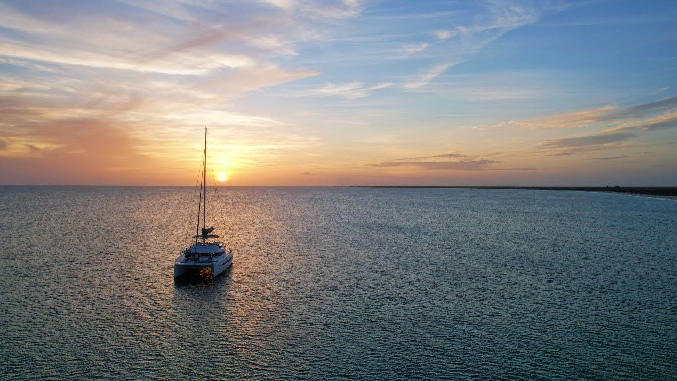 Discover Coral Group Bay in Barbuda - a tranquil anchorage with great snorkeling, local cuisine at Uncle Roddy's, and vibrant marine life. 
