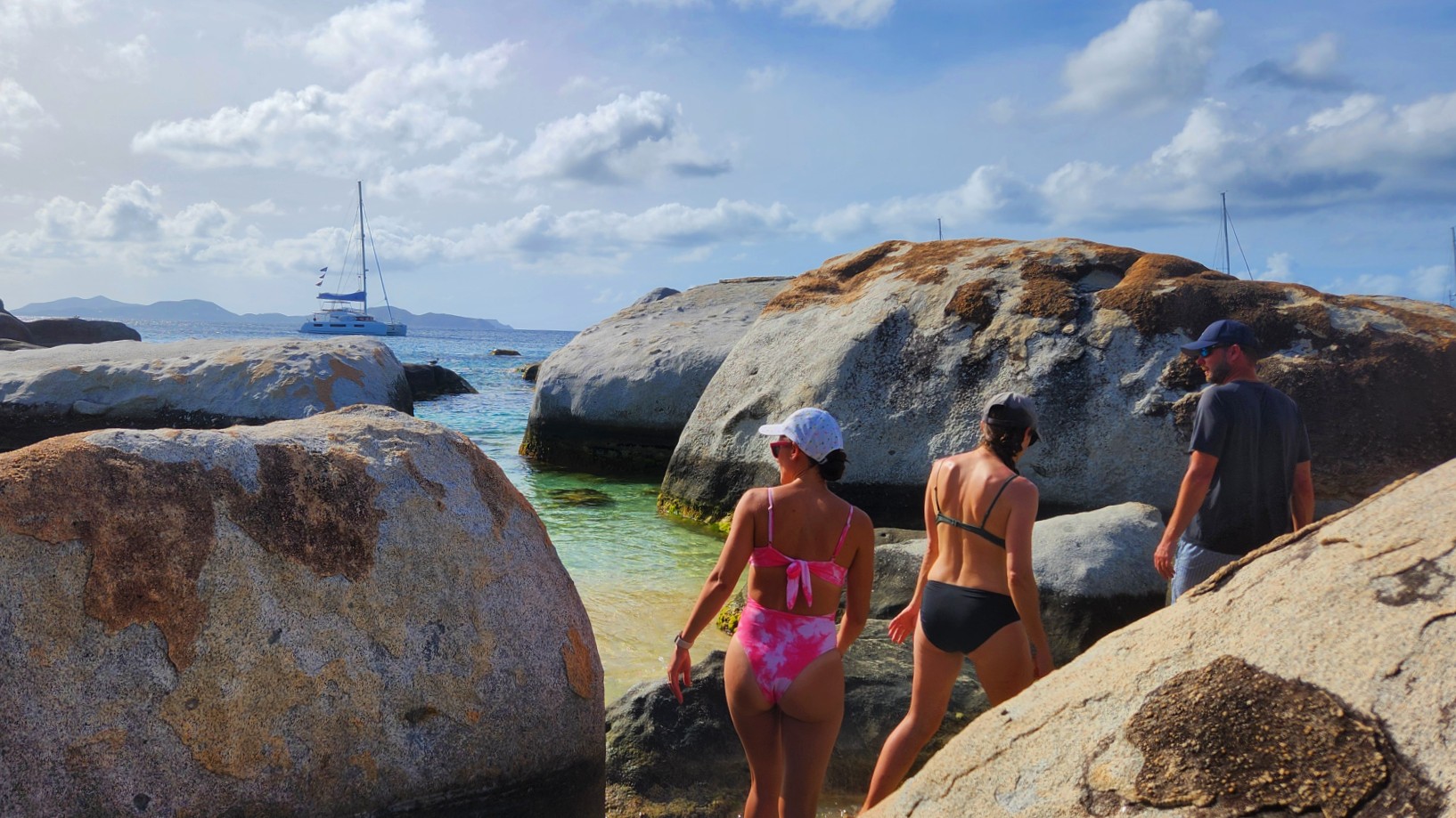 The Baths, Virgin Gorda in BVI: iconic granite boulders, sea pools, and the Caves Trail - a must-visit for adventurers.