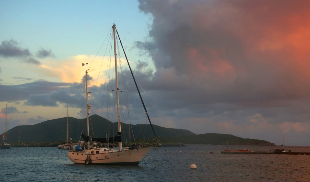 Explore Trellis Bay on Beef Island, a convenient stop near the airport with shopping, dining, and events like the Full Moon Party.