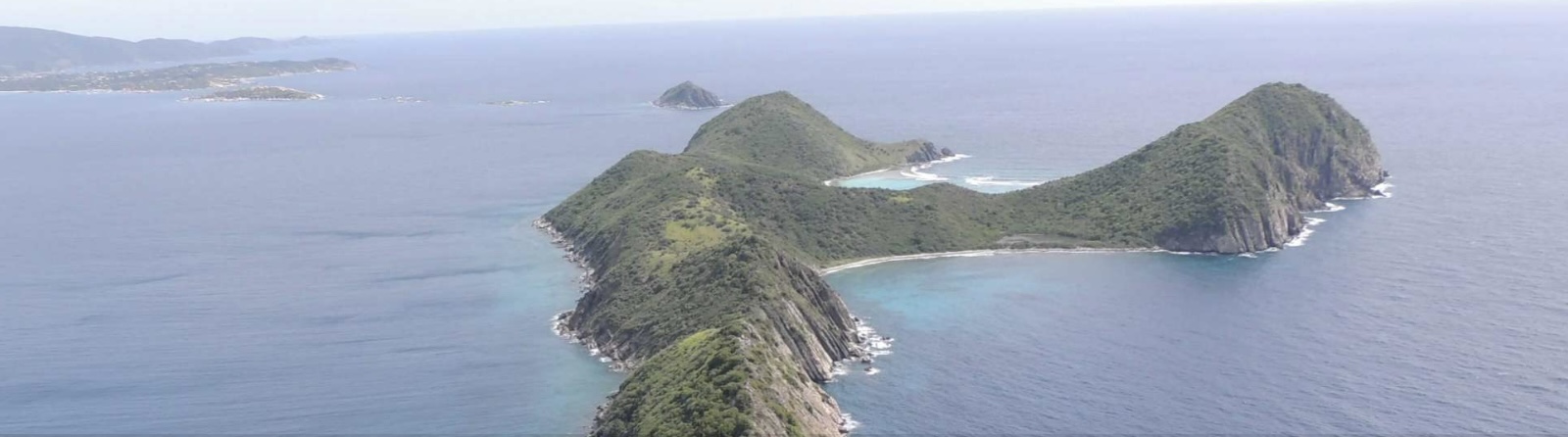Ginger Island in BVI: lush, uninhabited, but with few protected anchorages for bareboat charter crews.