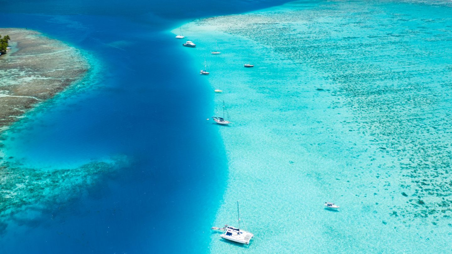 Visit Ha'amene Bay, Taha’a, a peaceful bay ideal for anchoring and exploring the island's lush interior.