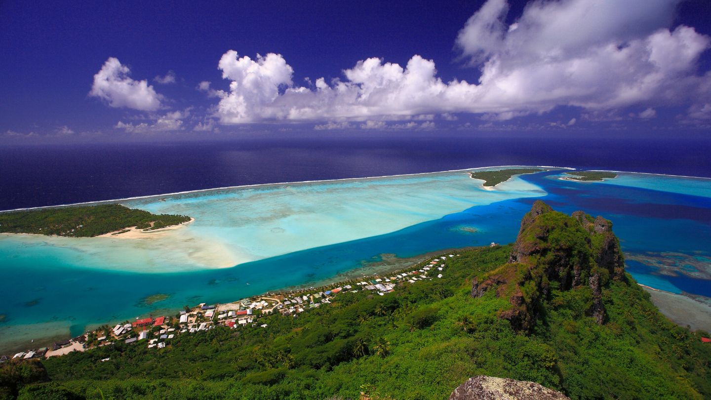 Hike Mount Teurafaatiu, Maupiti, for panoramic views of the island and lagoon, a must-do adventure.