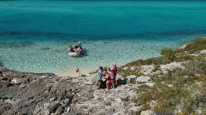 The kids searching for the lost pieces of the map at Hog Cay