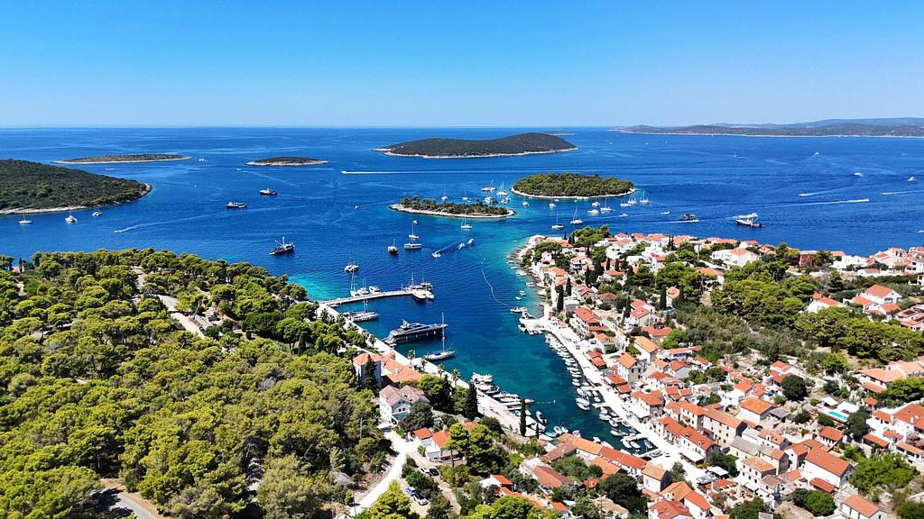 Aerial view of Croatia’s islands, harbors, and crystal-clear waters.