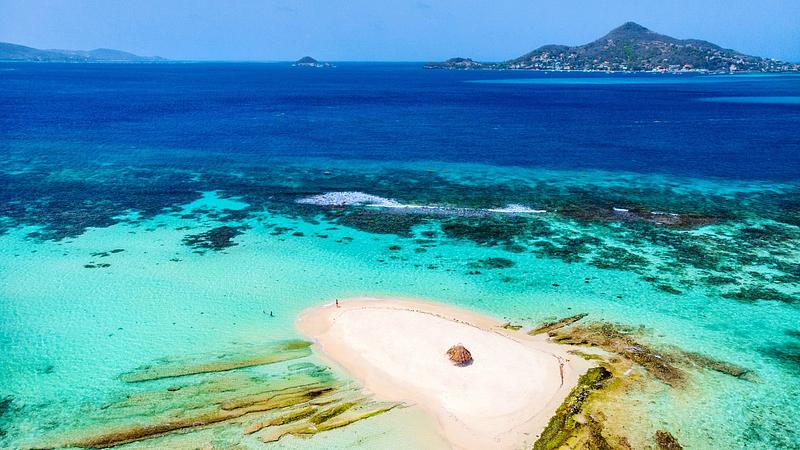 The lone umbrella at Mopion Island
